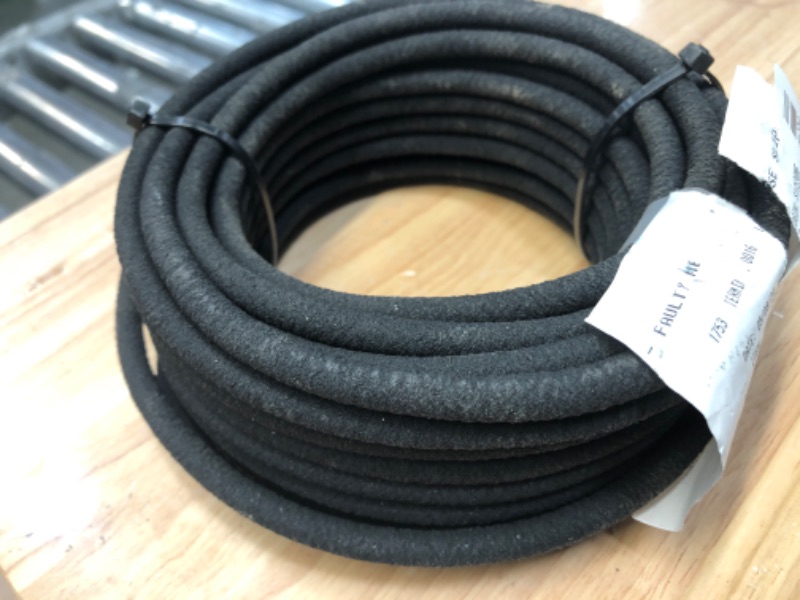 Photo 1 of (50 Foot) 1/4 in. Dripline Soaker Hose, Black Rubber Drip Irrigation Tubing (Compatible with Raindrip, Rainbird, Orbit Tubing & Fittings) (50 Foot)