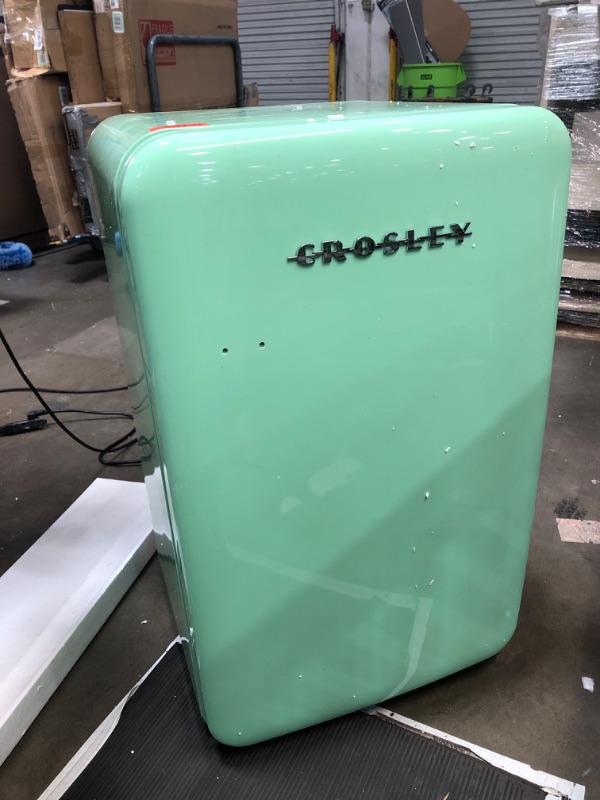 Photo 2 of *MINOR DAMAGE* Crosley 4.4 cuft Mini Fridge. TEAL COLORED Compact refrigerator without freezer for dorm, bedroom, apartment, room, office, bar, beverage, drink and beer. Small size w/cute patriotic flag bunting
