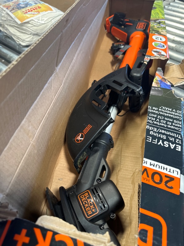 Photo 3 of ***USED - BATTERY AND STRING MISSING - UNABLE TO TEST - DIRTY***
BLACK+DECKER LSTE525 20V MAX Lithium Easy Feed String Trimmer/Edger with 2Batteries WITH BLACK+DECKER AF-100-3ZP 30ft 0.065" Line String Trimmer Replacement Spool, 3-Pack