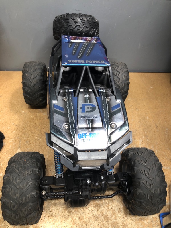 Photo 2 of **MISSING CONTROLLER , ***
DEERC Large 1:8 Scale Remote Control Monster Truck for Adults Boys, Upgraded RC Cars Remote Control Car, Off Road with Realistic Sound, 2.4Ghz 4WD Toy All Terrain Climbing, 2 Batteries for 80 Min Play Sliver Blue