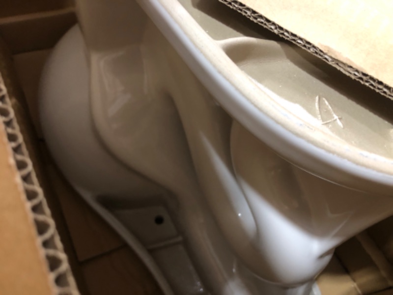 Photo 4 of 12 Inch Rough in Two-Piece 1.1 GPF/1.6 GPF Dual Flush Round Toilet in White Seat Included
