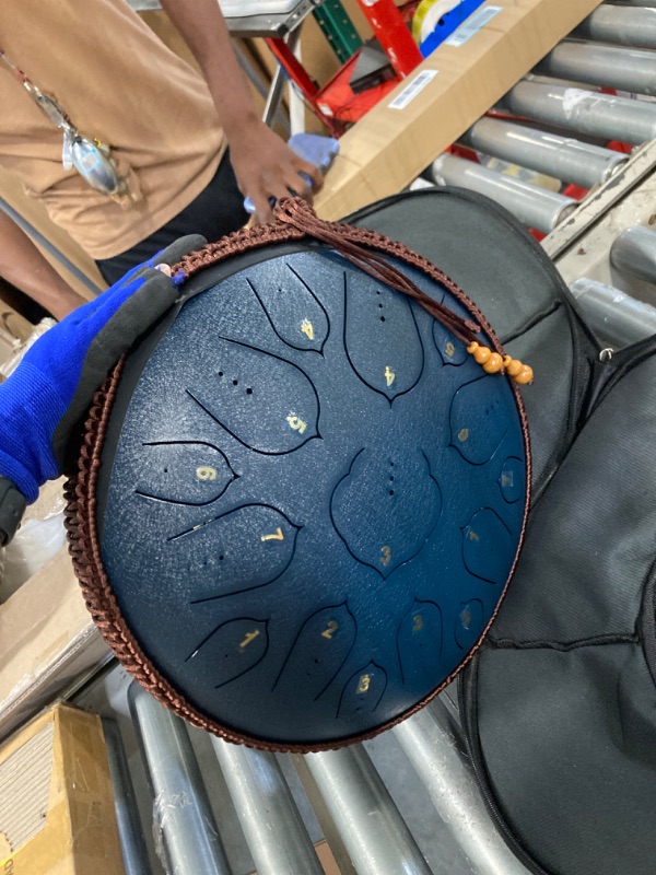 Photo 3 of ** missing mallets**
Steel Tongue Drum- ChunFeng 14 Inch 15 Notes Tongue Drum Instrument-Steel Drums For Adults-Hand Pan Drums With Music Book,Handpan Tongue Drum Mallets and Carry Bag,C Major(Blue)
