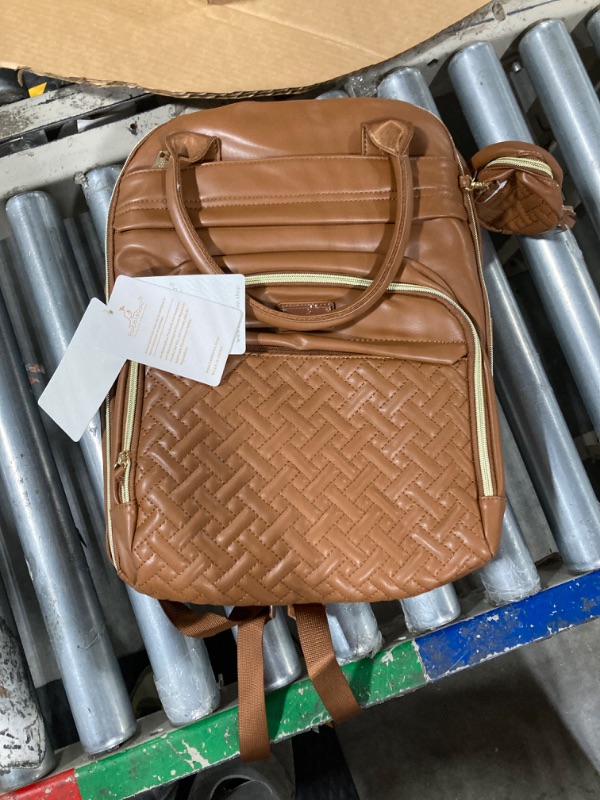 Photo 1 of BabbleRoo Leather Diaper Bag Backpack - Baby Essentials Travel Baby Bag, Multi function, Waterproof, with Changing Pad, Stroller Straps & Pacifier Case – Unisex, Natural Brown Faux Leather Natural Brown