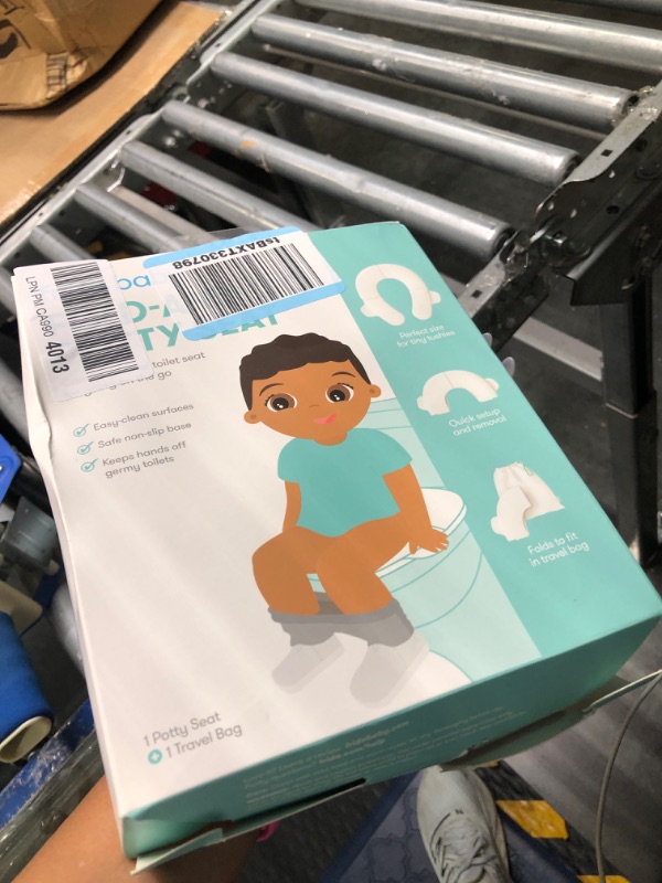 Photo 1 of Frida Baby Fold-and-Go Potty Seat | Folding Travel Potty Seat for Boys and Girls, Fits Round & Oval Toilets, Non-Slip Base, Handles, Includes Free Travel Bag