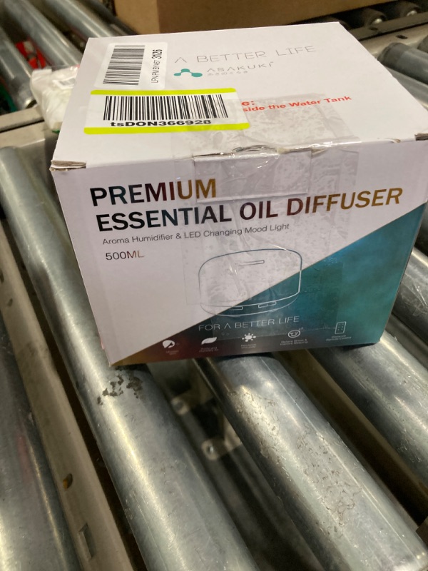 Photo 1 of ASAKUKI 500ml Premium, Essential Oil Diffuser with Remote Control, 5 in 1 Ultrasonic Aromatherapy Fragrant Oil Humidifier Vaporizer, Timer and Auto-Off Safety Switch Brown