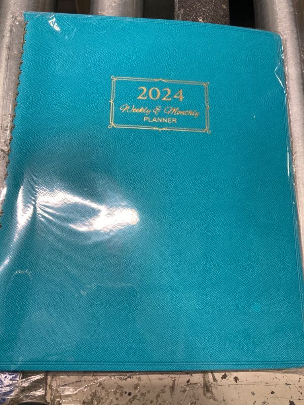 Photo 2 of ***Has writing on cover*** 2024 Planner - Planner 2024, Monthly planner 2024 with Leather Cover, 8.5 x 11, from Jan 2024 to Dec 2024, Twin-Wire Binding, 12 Printed Monthly Tabs green-new