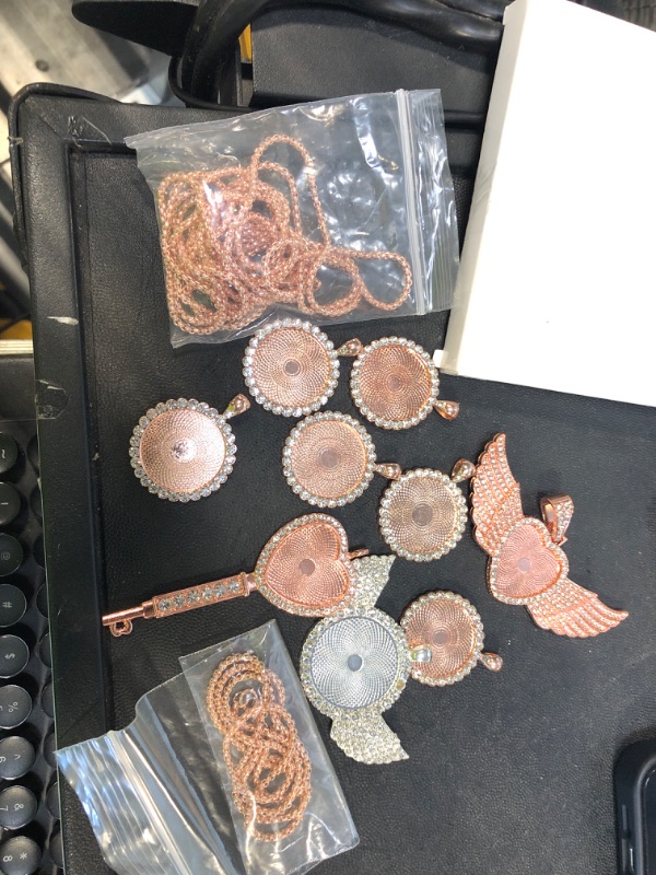 Photo 1 of 9 Pieces Sublimation Blank Necklace with Chain Set Blank Necklace Rhinestone Wing Shape Bezel Pendant Tray, 25 mm Sublimation Sheet, Double Sided Tape for DIY (Heart Shape Style)