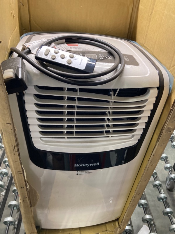 Photo 7 of *****Missing air exhaust line*******Honeywell 9,000 BTU Portable Air Conditioner for Bedroom, Living Room, Apartment, 115V, Cools Rooms Up to 400 Sq. Ft. with Dehumidifier & Fan, 24-hour Timer, Remote, White/Black Up to 400 Sq. Ft. White/Black