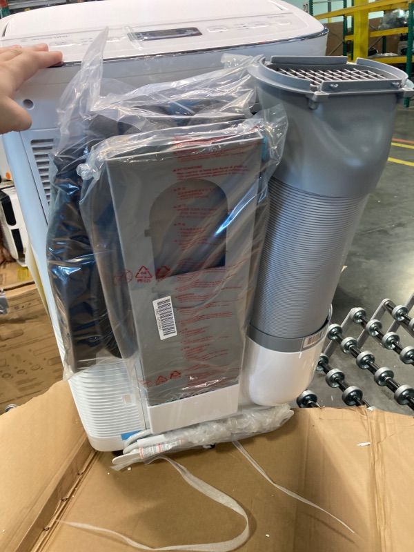 Photo 7 of ****NON FUNCTIONAL//SOLD AS PARTS ALL SALES FINAL**** 
LG Dual Inverter Portable Air Conditioner Unit for Medium Rooms, Bedroom, Office, Kitchen, Dining Room, 115V, Cools up to 500 Sq. Ft., 3 Speeds, 24-hour Timer, with Wi-Fi Control and Remote, White 1 C