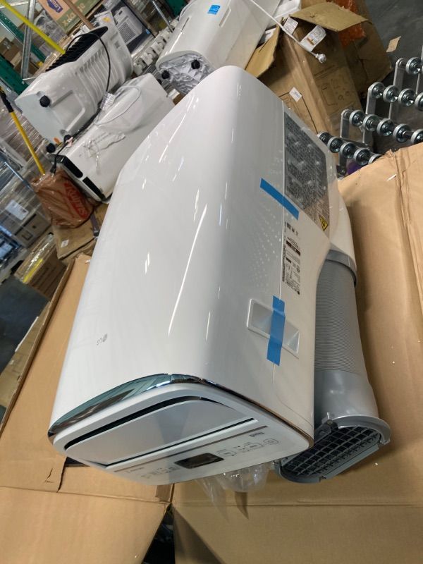 Photo 4 of ****NON FUNCTIONAL//SOLD AS PARTS ALL SALES FINAL**** 
LG Dual Inverter Portable Air Conditioner Unit for Medium Rooms, Bedroom, Office, Kitchen, Dining Room, 115V, Cools up to 500 Sq. Ft., 3 Speeds, 24-hour Timer, with Wi-Fi Control and Remote, White 1 C