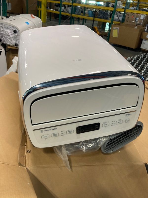 Photo 6 of ****NON FUNCTIONAL//SOLD AS PARTS ALL SALES FINAL**** 
LG Dual Inverter Portable Air Conditioner Unit for Medium Rooms, Bedroom, Office, Kitchen, Dining Room, 115V, Cools up to 500 Sq. Ft., 3 Speeds, 24-hour Timer, with Wi-Fi Control and Remote, White 1 C