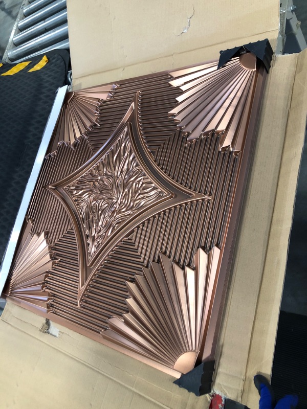 Photo 3 of ** new, opened package**
Art3d Drop Ceiling Tiles 24x24 in Bronze (12-Pack, 48 Sq.ft), 3D Wainscoting Panels Glue Up 2x2 24"x24" Bronze 12