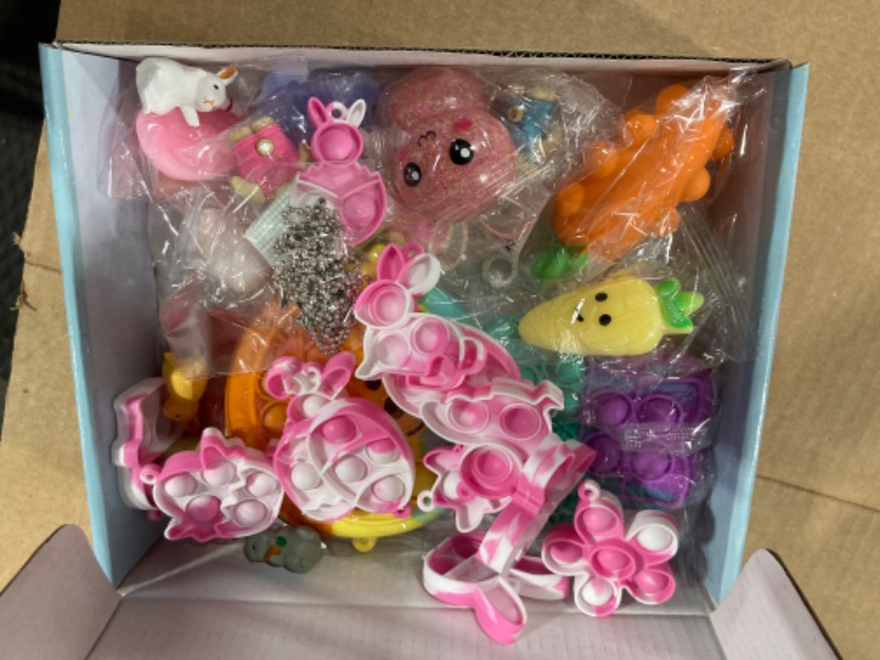 Photo 1 of Easter Basket Stuffers - Pop Easter Basket Bunny Purse Bags Sensory Fidget Toy Pack for Kids Toddlers Teens Girls Boys - Great Easter Gift Set for Easter Hunts and Party Favor