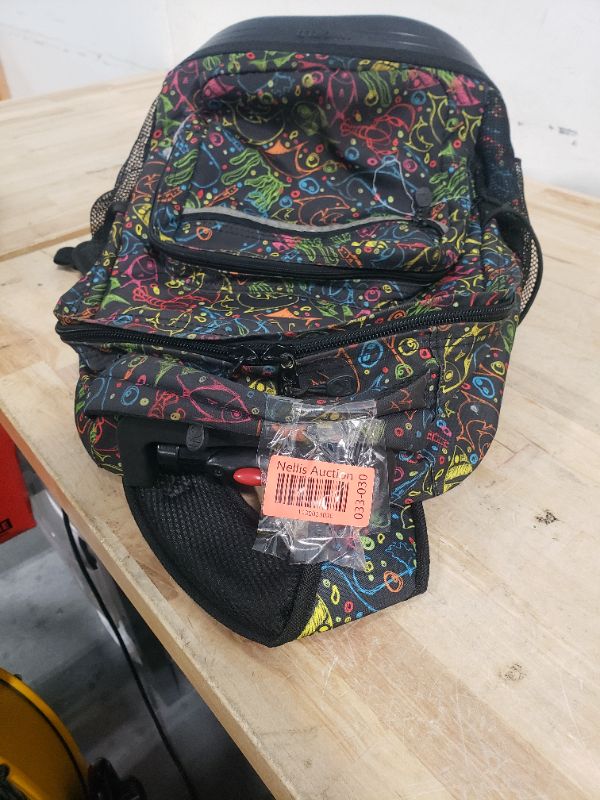 Photo 1 of *heavily used, but still functional*
JWORLD luggage backpack limited edition print pattern
medium zipper portion coming loose threads
*be advised - AS IS NO RETURNS - Item works, but is very used - price drop  AB*