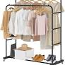 Photo 1 of Double Rods Clothing Rack with Wheels, Garment Rack for Hanging Clothes, Multi-functional Bedroom Clothes Rack, Black
 
