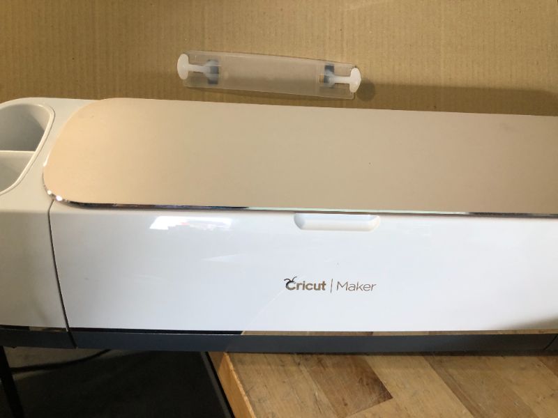 Photo 6 of ****USED**MISSING POWER CORD** Cricut Maker - Smart Cutting Machine - With 10X Cutting Force, Cuts 300+ Materials, Create 3D Art, Home Decor, Bluetooth Connectivity, works with iOS, Android, Windows & Mac, Champagne,26.38 x 11 x 11
NO POWER CORD 