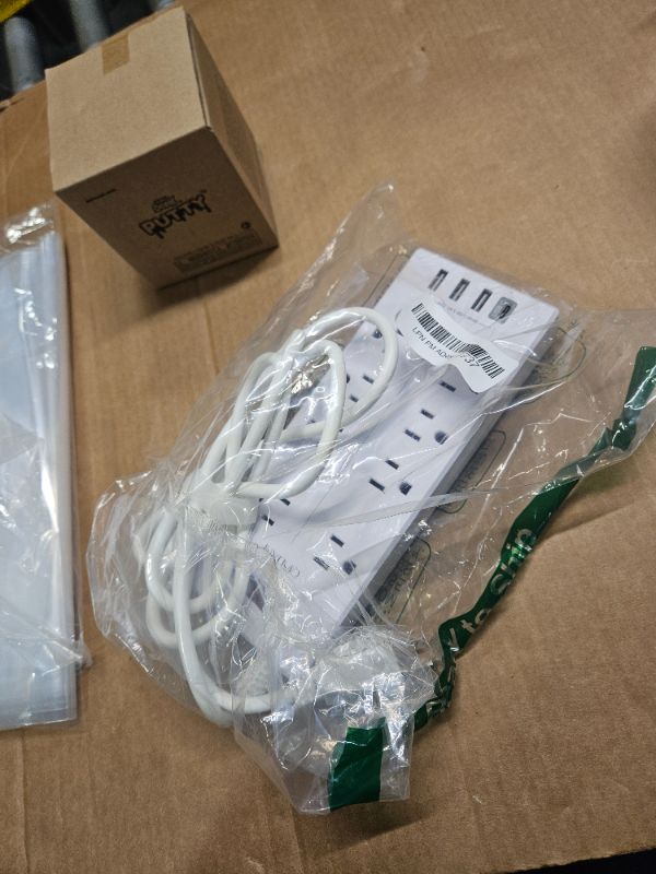 Photo 2 of ****USED*** 10 Ft Power Strip Surge Protector- 8 Outlets and 4 USB Ports (5V/2.4A) & 1 USB-C Port (5V/3A), 1875W/15A, Flat Plug, Spaced Outlets, Wall Mount for Hotel, Home and Office White 10 Ft 8 Outlets White