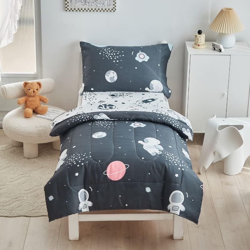 Photo 1 of 4 Pieces Toddler Bedding Set Space Theme for Baby Boys, Astronaut Planet Rocket Print on Black, Includes Comforter, Flat Sheet, Fitted Sheet and Pillowcase
