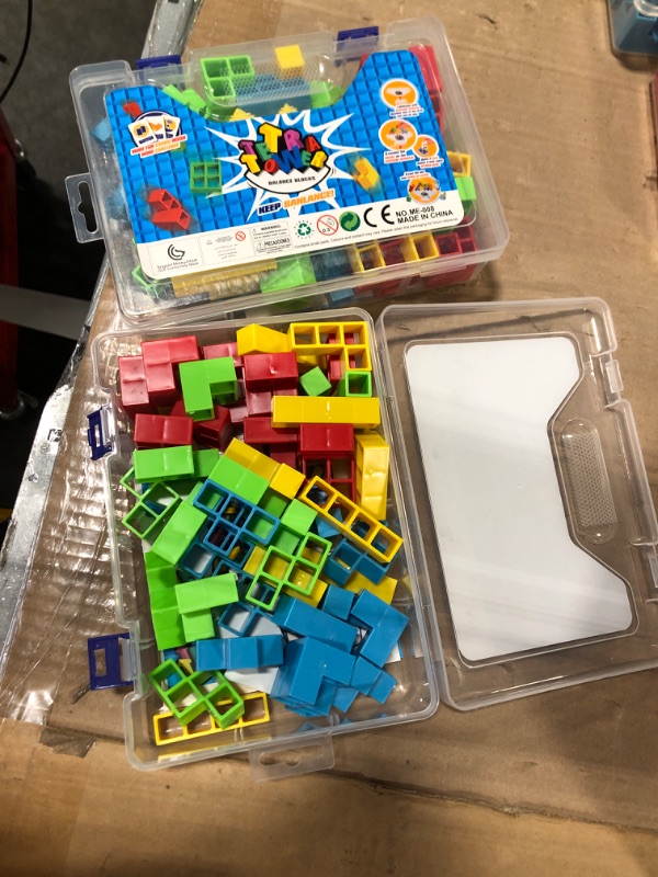 Photo 1 of 48 PCS Tetra Tower Game for Adult & Kids, Stack Attack Games for Family Travel Party, Tetra Tower Balancing Stacking Blocks Board Games for 2+ Players 48 PCS+Storage Box 2 set