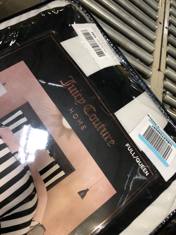 Photo 4 of ***USED**Juicy Couture Cabana Stripe Reversible Bedding Set - Queen Size - Black and White Stripe Print – 6 Piece Set – Includes 1 90" x 90" Comforter, 3 Decorative Pillows, 2 Shams
