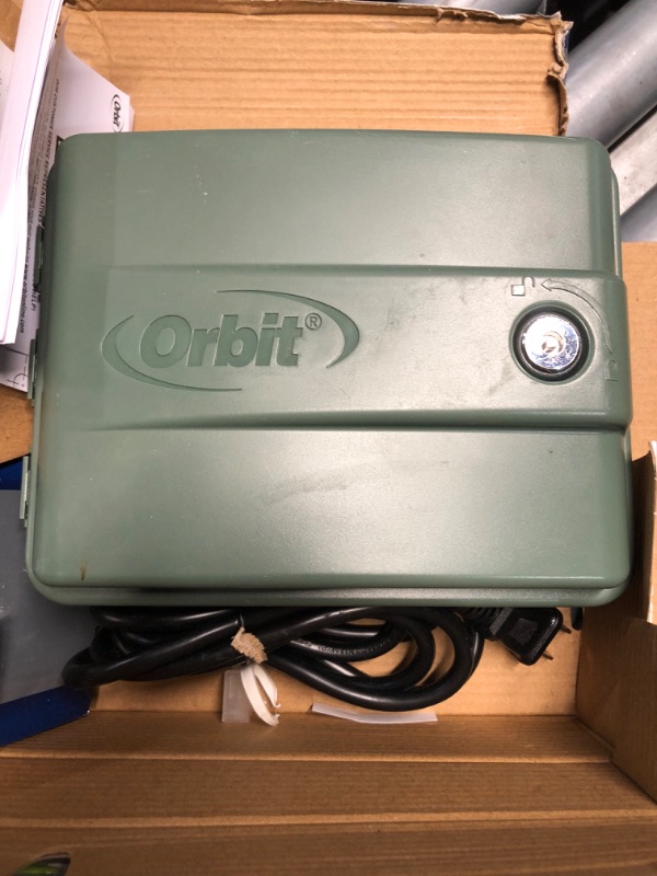 Photo 3 of **KEY NOT INCLUDED**
Orbit 57894 4-Station Outdoor Swing Panel Sprinkler System Timer 4-Station Green