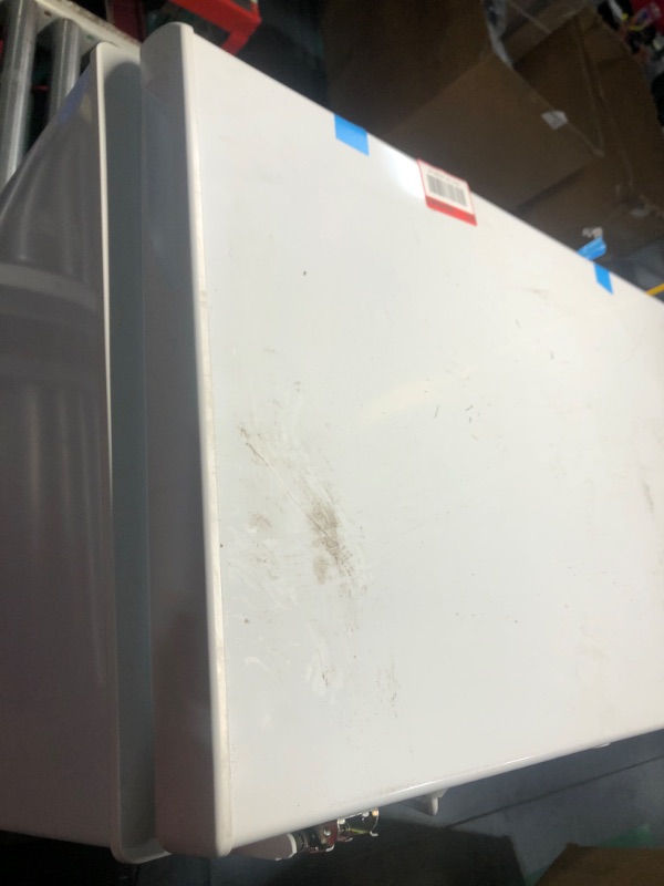 Photo 3 of **NON-REFUNDABLE, PARTS ONLY** 6.9 cu. ft. Manual Defrost Chest Freezer with LED Light Type in White Garage Ready *Lid damaged, side dented in, back hinges damaged*
