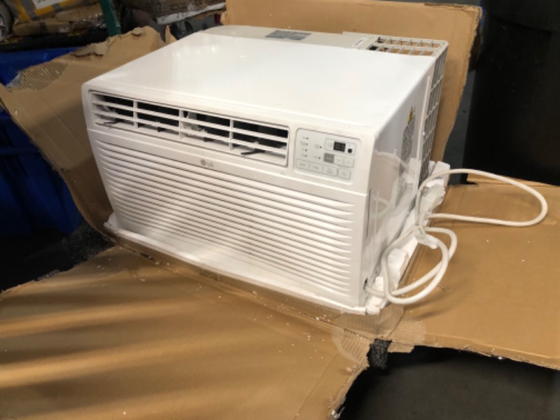 Photo 9 of ***DAMAGED - MISSING PARTS - UNTESTED - SEE COMMENTS***
LG 11,800 BTU Through the Wall Air Conditioner, 115V, Cools up to 530 Sq. Ft. for Bedroom, Living Room, Apartment, with Remote, 3 Cool & Fan Speeds, Universal design fits most sleeves, White 1 Count 