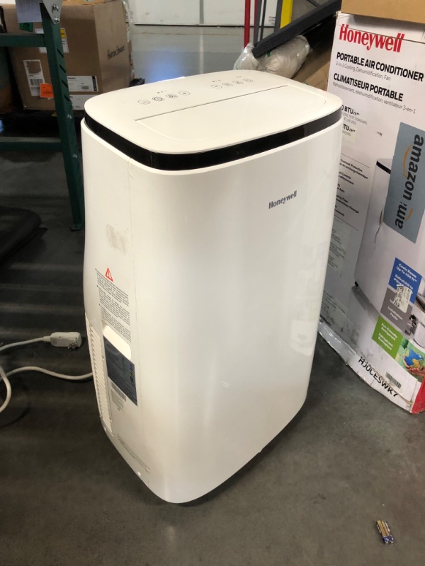 Photo 4 of ***USED - UNTESTED - NO PACKAGING - SEE COMMENTS***
Honeywell 10,000 BTU Portable Air Conditioner for Bedroom, Living Room, Office, Kitchen, 115V, Cools Up To 450 Sq. Ft. with Remote Control, Dehumidifier and Fan, 24-hour Timer, White