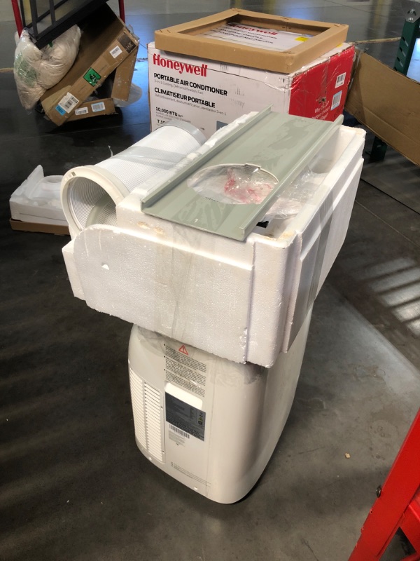 Photo 2 of ***USED - UNTESTED - NO PACKAGING - SEE COMMENTS***
Honeywell 10,000 BTU Portable Air Conditioner for Bedroom, Living Room, Office, Kitchen, 115V, Cools Up To 450 Sq. Ft. with Remote Control, Dehumidifier and Fan, 24-hour Timer, White