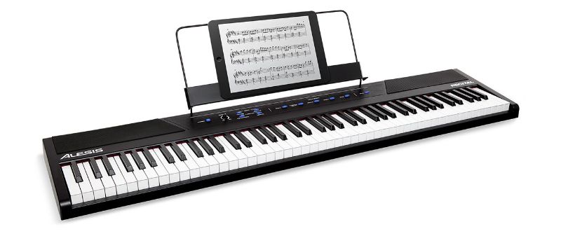 Photo 1 of (READ FULL POST) Recital – 40+ Key Digital Piano Keyboard with Semi Weighted Keys, 2x20W Speakers, 5 Voices, Split, Layer and Lesson Mode, FX and Piano Lessons
