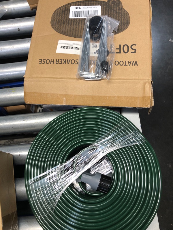 Photo 2 of ***LOOKS BRAND NEW*** Watoo 2024 50 FT Flat Sprinkler Hose for Lawn Watering Garden Soaker