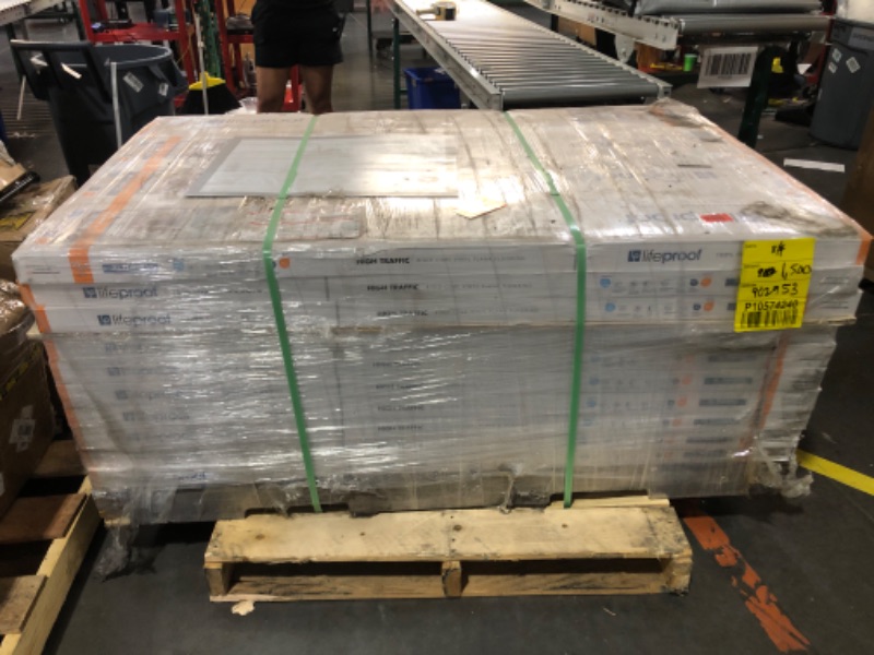 Photo 4 of *** PALLET OF FLOORING PANNELS  SOLD AS IS- TRUCK/TRAILER PICKUP ONLY*** Hudspeth Walnut 22 MIL x 8.7 in. W x 59 in. L Waterproof Click Lock Luxury Vinyl Plank Flooring