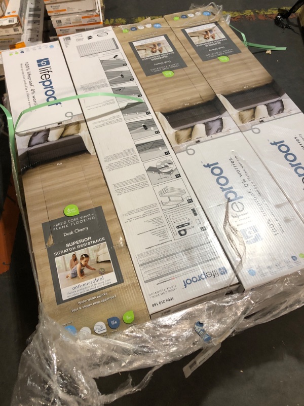 Photo 2 of *** PALLET OF FLOORING - TRUCK/TRAILER PICKUP ONLY*** Lifeproof Dusk Cherry 6 MIL x 8.7 in. W x 48 in. L Click Lock Waterproof Luxury Vinyl Plank Flooring  TOTAL OF 16 BOXES 