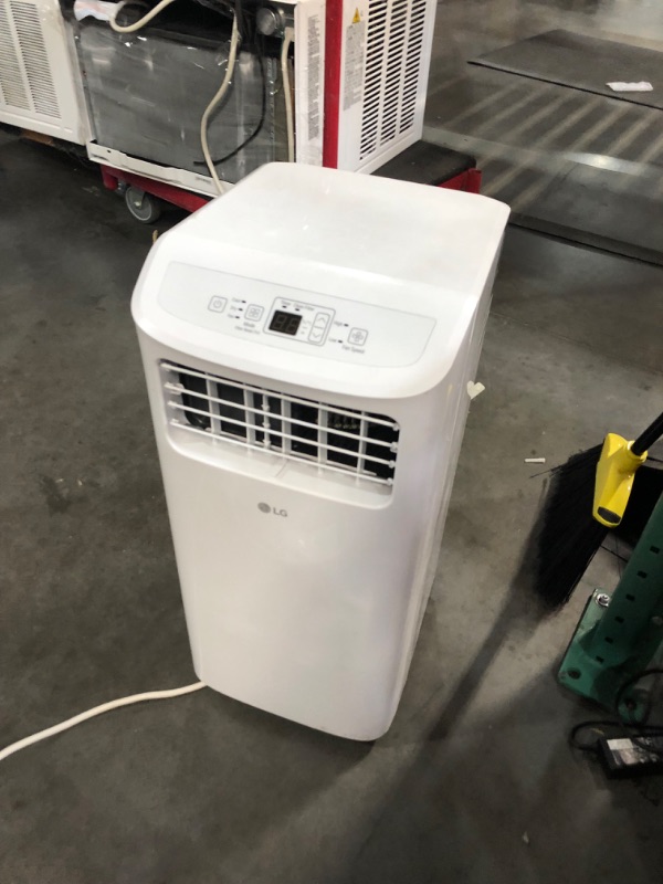 Photo 3 of ***USED AND DIRTY - POWERS ON - LIKELY MISSING PARTS - SEE PICTURES***
LG LP0624WFR Portable Air Conditioner w/Remote, Cools 250 Sq.Ft, Quiet Operation, 115V, 6,000 BTU (9700 ASHRAE), White