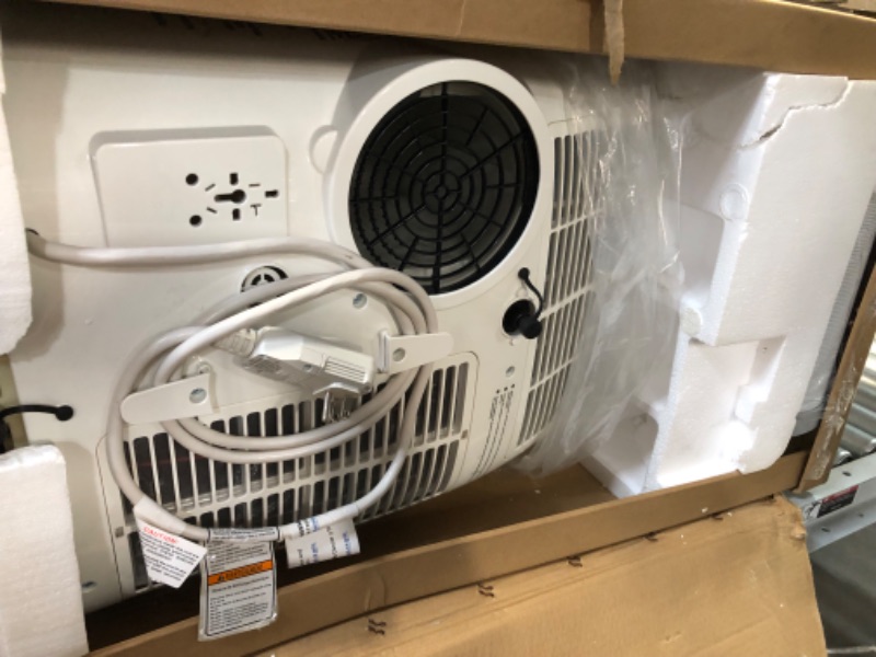 Photo 4 of **PARTS ONLY NON REFUNDABLE** READ NOTES**
Honeywell 7,100 BTU (10,000 BTU ASHRAE) Portable Air Conditioner with Dehumidifier & Fan up to 400 sq ft, HJ0CESWK7