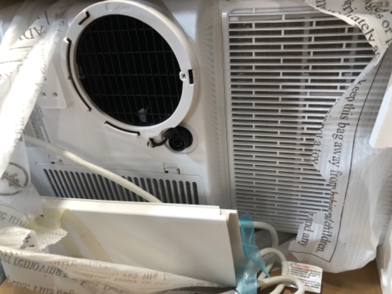 Photo 5 of ***HEAVILY USED AND DIRTY - POWERS ON - UNABLE TO TEST FURTHER - LIKELY MISSING PARTS - SEE PICTURES***
Midea 14,000 BTU ASHRAE (10,000 BTU SACC) Portable Air Conditioner, Cools up to 375 Sq. Ft., with Dehumidifier & Fan 