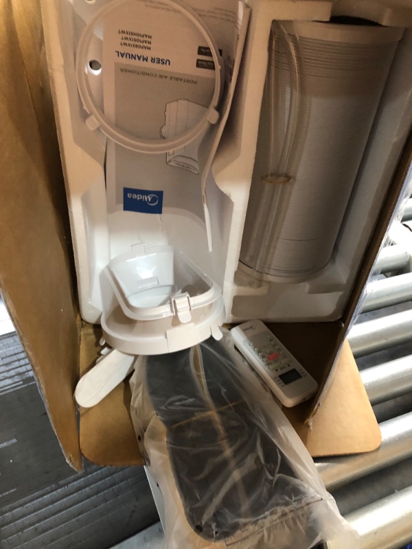 Photo 4 of ***HEAVILY USED AND DIRTY - POWERS ON - UNABLE TO TEST FURTHER - LIKELY MISSING PARTS - SEE PICTURES***
Midea 14,000 BTU ASHRAE (10,000 BTU SACC) Portable Air Conditioner, Cools up to 375 Sq. Ft., with Dehumidifier & Fan 