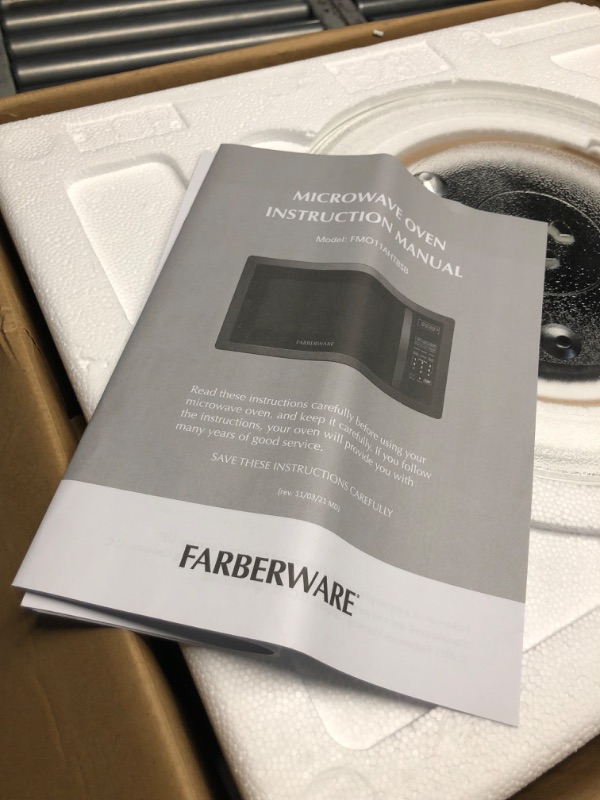 Photo 4 of ***USED - DAMAGED - UNTESTED - SEE COMMENTS***
Farberware Countertop Microwave 1000 Watts, 1.1 cu ft - Microwave Oven With LED Lighting and Child Lock - Perfect for Apartments and Dorms - Easy Clean Black Stainless Steel