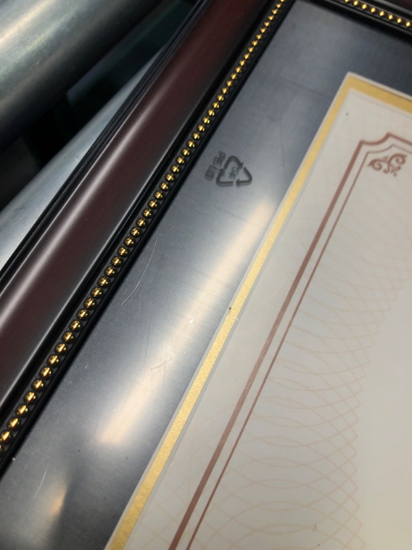 Photo 5 of ***USED - SCRATCHED - SEE PICTURES***
GraduatePro 8.5x11 Diploma Frame, Picture Frame for Wall and Tabletop Display with UV Protection Acrylic, Professional Wooden Look, Mahogany with Gold Beaded Mahogany With Gold Beads 8.5x11