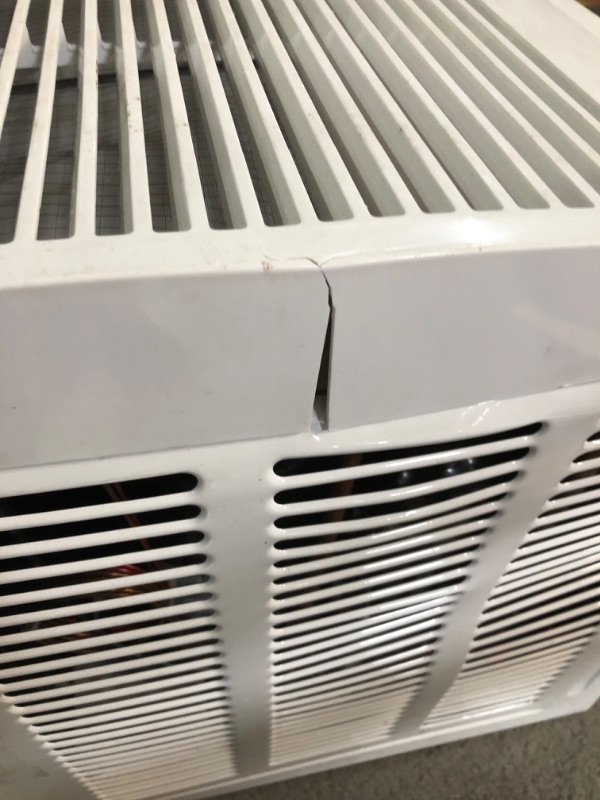 Photo 13 of ***USED - MAJOR DAMAGE - UNTESTED - SEE COMMENTS***
LG 24,500 BTU 208/230-Volt Window Air Conditioner Cools 1,550 Sq. Ft. with Remote in White