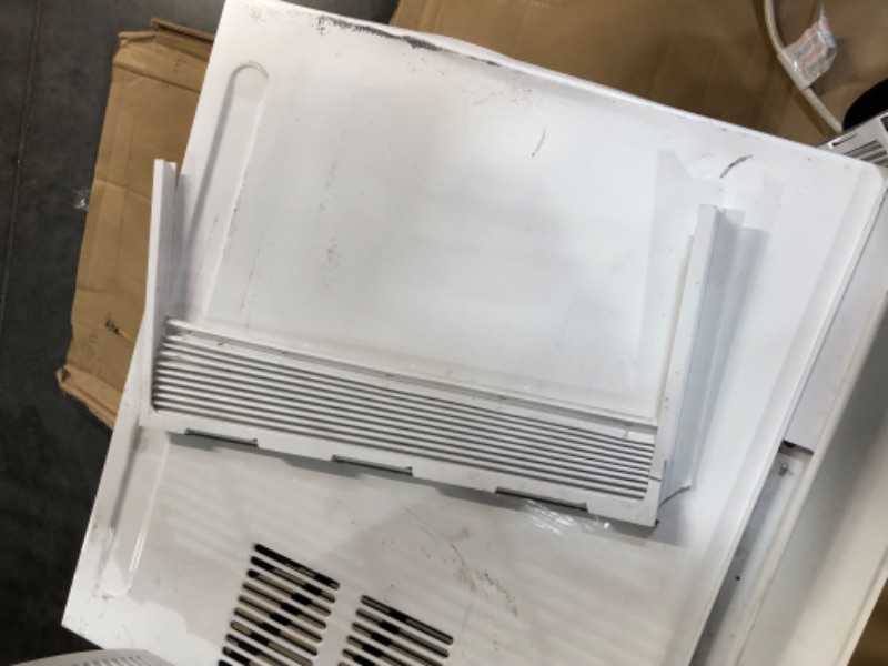 Photo 10 of ***USED - MAJOR DAMAGE - UNTESTED - SEE COMMENTS***
LG 24,500 BTU 208/230-Volt Window Air Conditioner Cools 1,550 Sq. Ft. with Remote in White