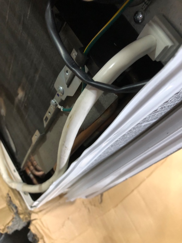 Photo 9 of ***USED - MAJOR DAMAGE - UNTESTED - SEE COMMENTS***
LG 24,500 BTU 208/230-Volt Window Air Conditioner Cools 1,550 Sq. Ft. with Remote in White