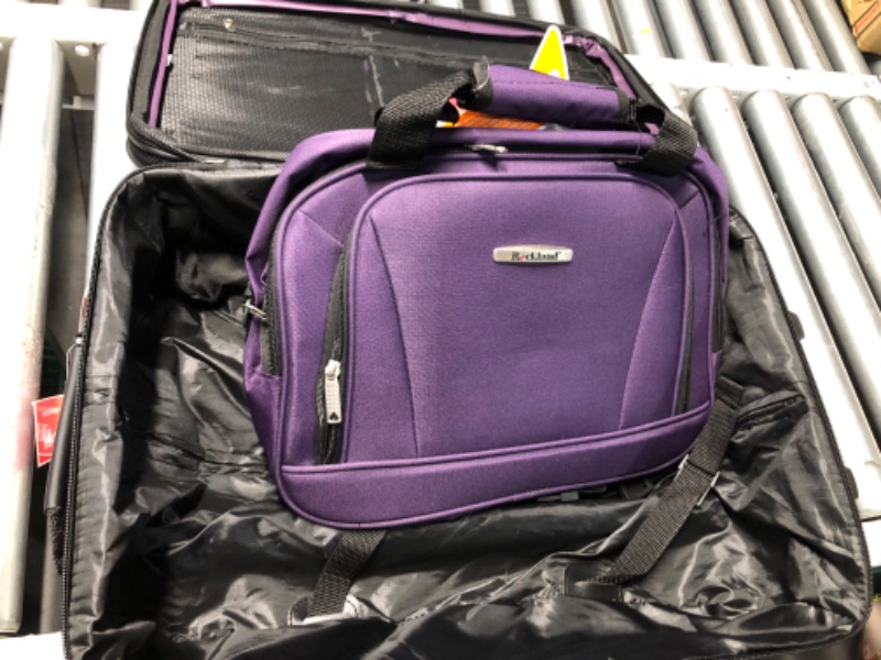 Photo 2 of ***DAMAGED - SLASHED ON BACK - SEE PICTURES***
Rockland Fashion Expandable Softside Upright Luggage Set, Purple, 2-Piece (14/19) 2-Piece Set (14/19) Purple Standard Packaging