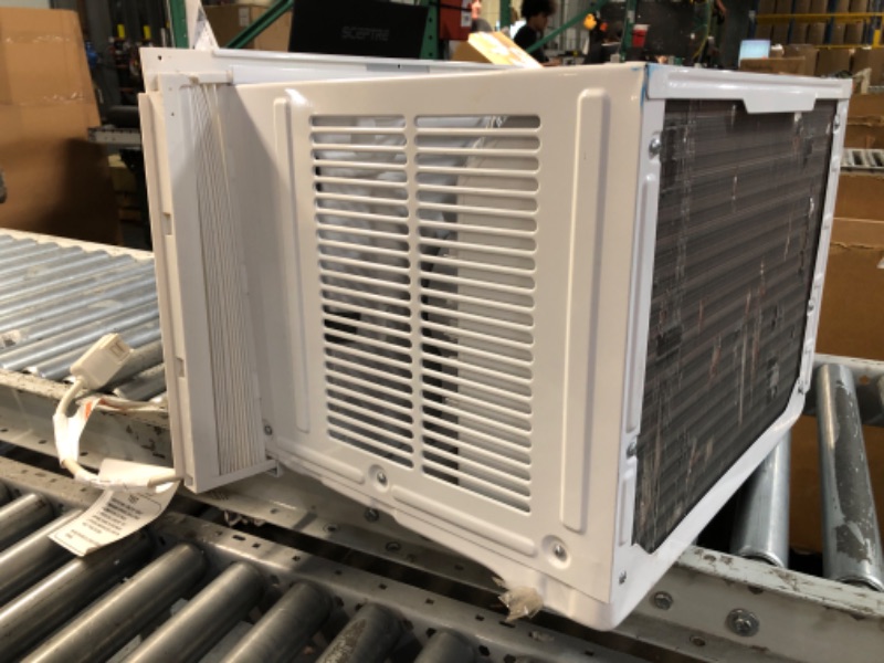 Photo 1 of (minor damage)(no returns) 
***STOCK PHOTO REFERENCE ONLY***
Whirlpool WHAT122-HAW 12,000 230V Air Conditioner with Supplemental Heat, Dehumidifier and Remote, Wall AC Unit for Apartment, Living Medium Rooms 
