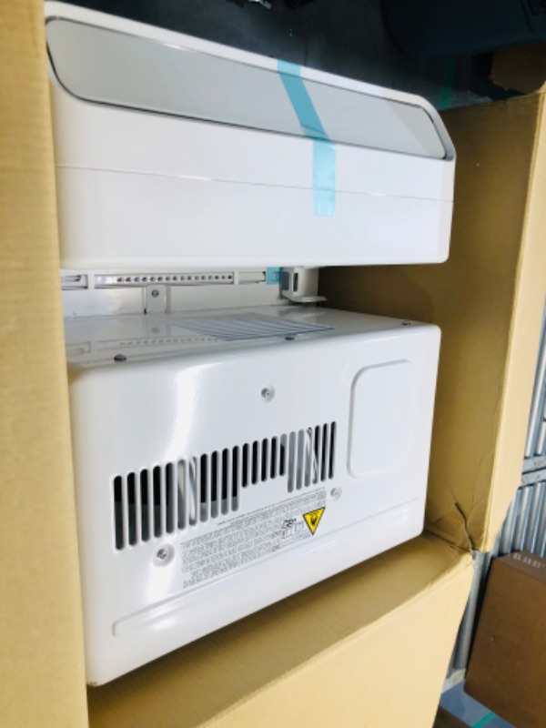 Photo 6 of ***USED - DAMAGED - UNTESTED - SEE COMMENTS***
Midea 10,000 BTU U-Shaped Smart Inverter Window Air Conditioner–Cools up to 450 Sq. Ft., Ultra Quiet with Open Window Flexibility, Works with Alexa/Google Assistant, 35% Energy Savings, Remote Control 10000 B