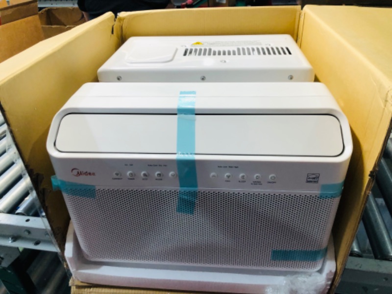 Photo 7 of ***USED - DAMAGED - UNTESTED - SEE COMMENTS***
Midea 10,000 BTU U-Shaped Smart Inverter Window Air Conditioner–Cools up to 450 Sq. Ft., Ultra Quiet with Open Window Flexibility, Works with Alexa/Google Assistant, 35% Energy Savings, Remote Control 10000 B