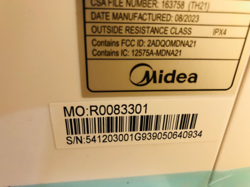 Photo 5 of ***USED - DAMAGED - UNTESTED - SEE COMMENTS***
Midea 10,000 BTU U-Shaped Smart Inverter Window Air Conditioner–Cools up to 450 Sq. Ft., Ultra Quiet with Open Window Flexibility, Works with Alexa/Google Assistant, 35% Energy Savings, Remote Control 10000 B