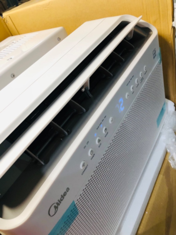 Photo 10 of ***USED - DAMAGED - UNTESTED - SEE COMMENTS***
Midea 10,000 BTU U-Shaped Smart Inverter Window Air Conditioner–Cools up to 450 Sq. Ft., Ultra Quiet with Open Window Flexibility, Works with Alexa/Google Assistant, 35% Energy Savings, Remote Control 10000 B