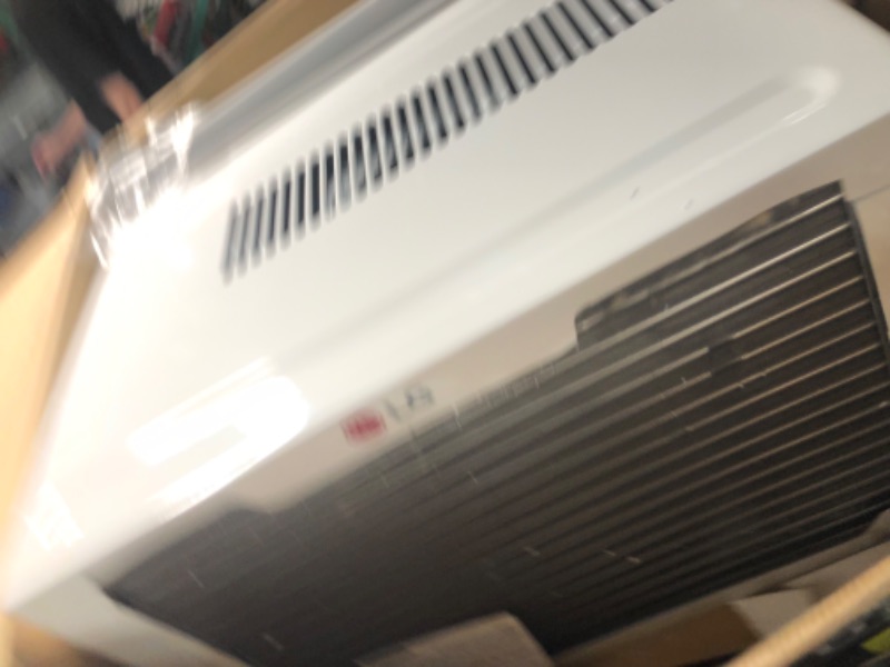 Photo 1 of ***USED - DAMAGED - BENT - UNABLE TO TEST - LIKELY MISSING PARTS - SEE PICTURES***
LG 14000 BTU Smart Wi-Fi Enabled Window Air Conditioner with 4-Way Air Deflection, Thermostat Control, Cools 700 Square Feet for Bedroom, Living Room and Apartment