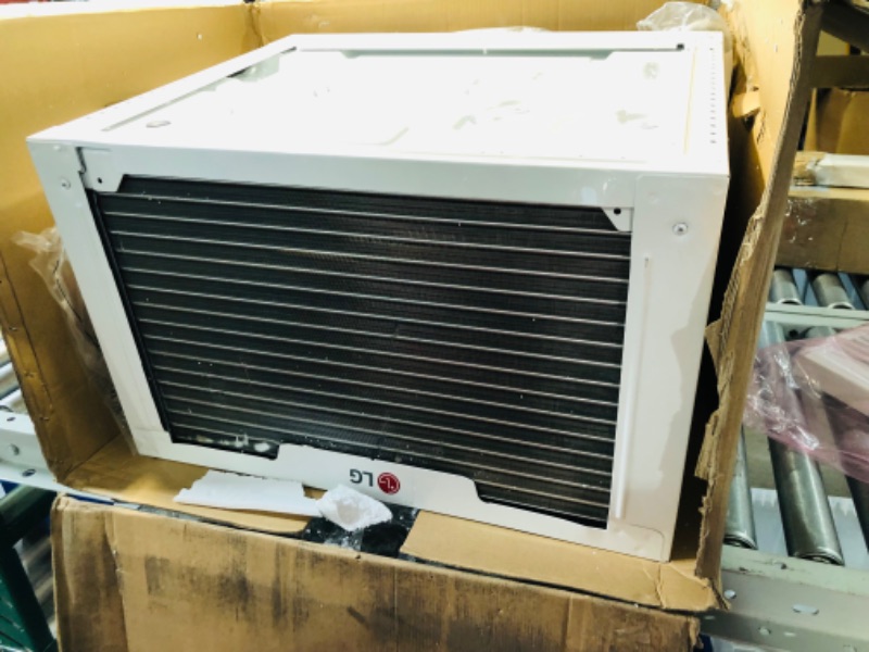 Photo 11 of ***USED - DAMAGED - BENT - UNABLE TO TEST - LIKELY MISSING PARTS - SEE PICTURES***
LG 14000 BTU Smart Wi-Fi Enabled Window Air Conditioner with 4-Way Air Deflection, Thermostat Control, Cools 700 Square Feet for Bedroom, Living Room and Apartment